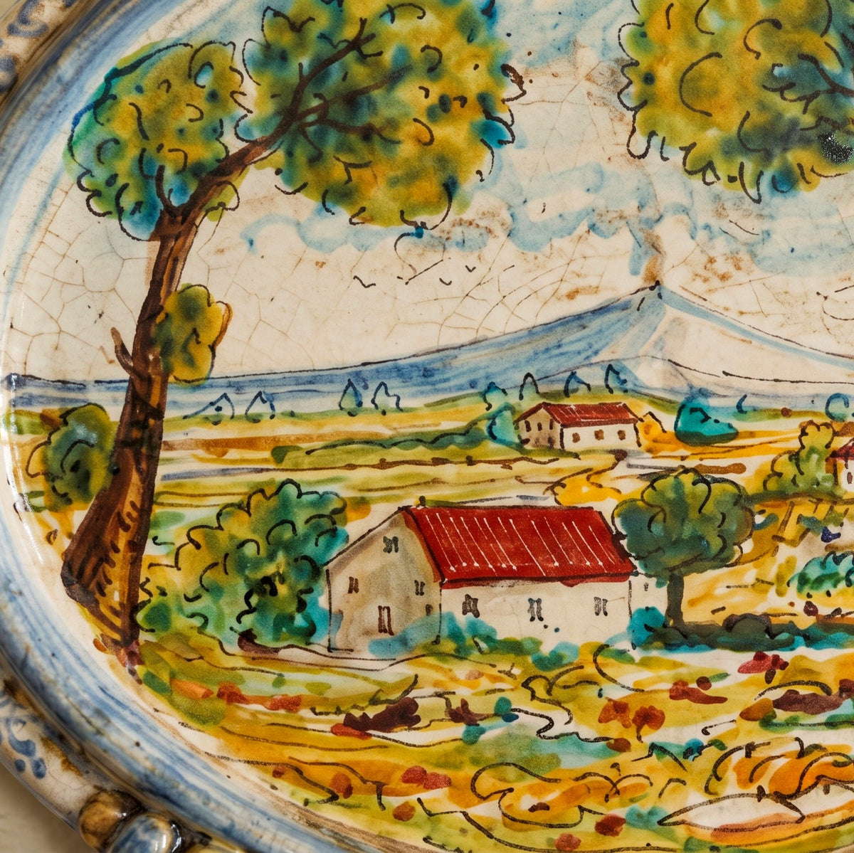 Ovale Orizzontale in Ceramica di Caltagirone 23×25 cm - Paesaggio, Blu e Arancio