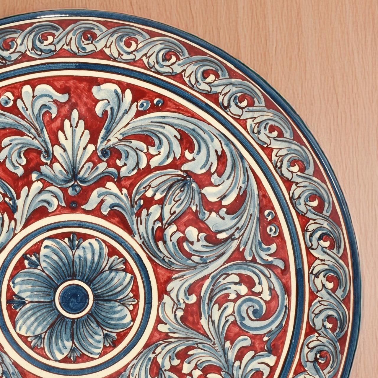 Piatto ornamentale ornato blu/bordeaux in ceramica artigianale di Caltagirone. - Ceramiche di Caltagirone Sofia
