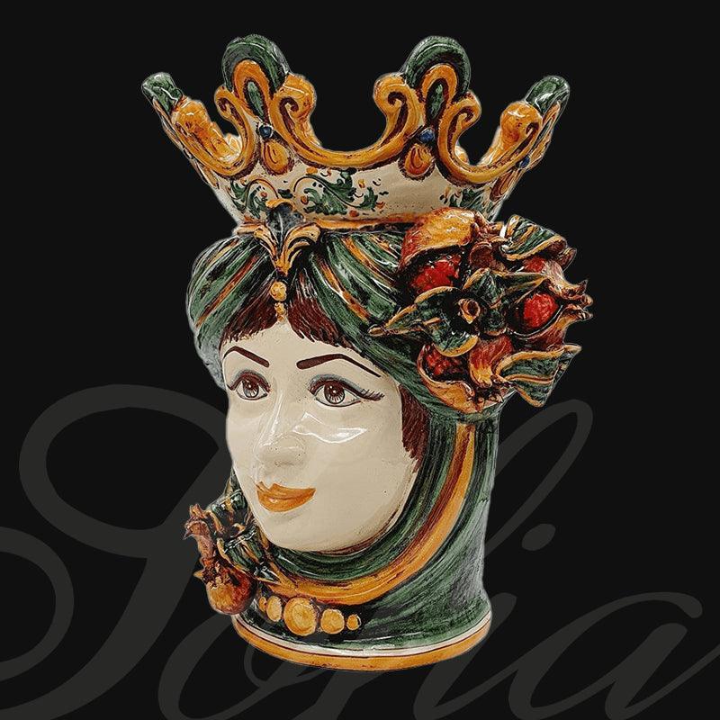 Testa di donna in ceramica di Caltagirone fatta a mano con corona gialla e decori melograno verde-arancio