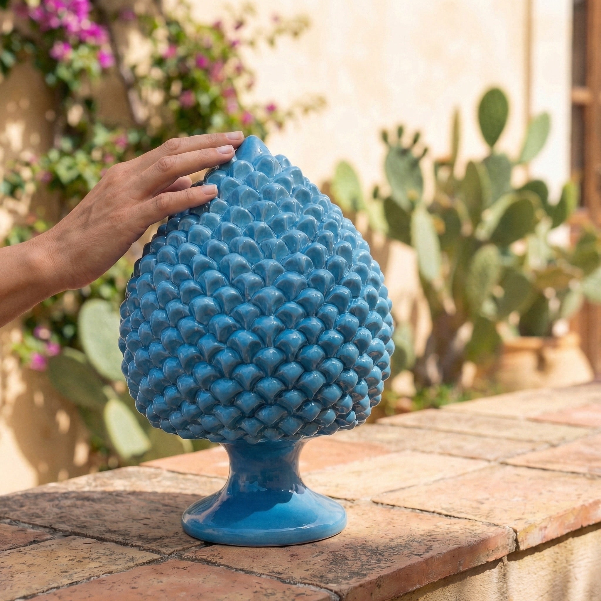 Pigna artigianale di Caltagirone modellata a mano altezza 15/40 turchese