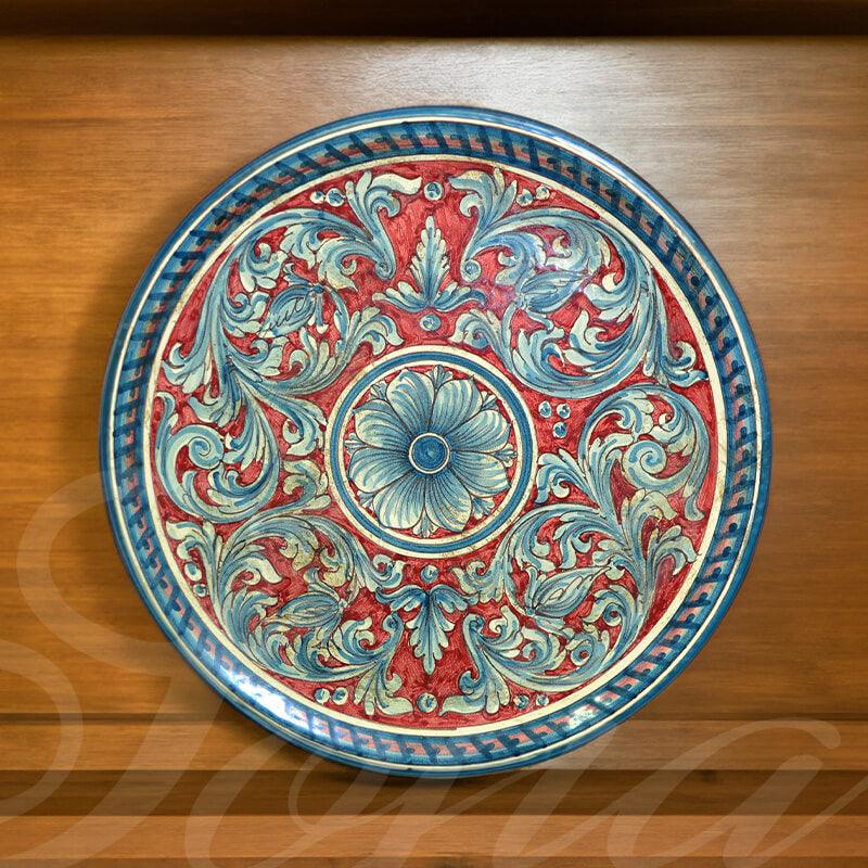 Piatto ornamentale ornato blu/bordeaux in ceramica artigianale di Caltagirone. - Ceramiche di Caltagirone Sofia